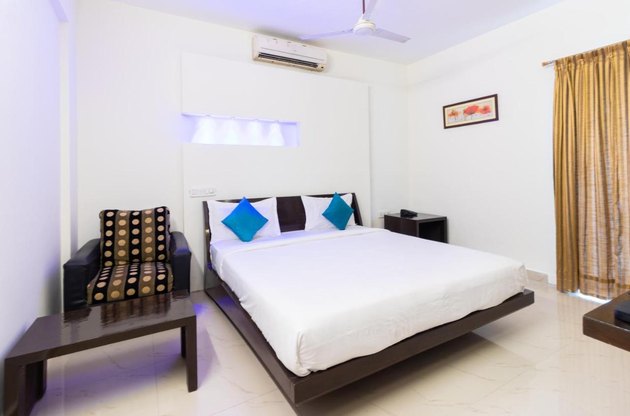 Sanctum Suites Domlur Μπανγκαλόρ Δωμάτιο φωτογραφία